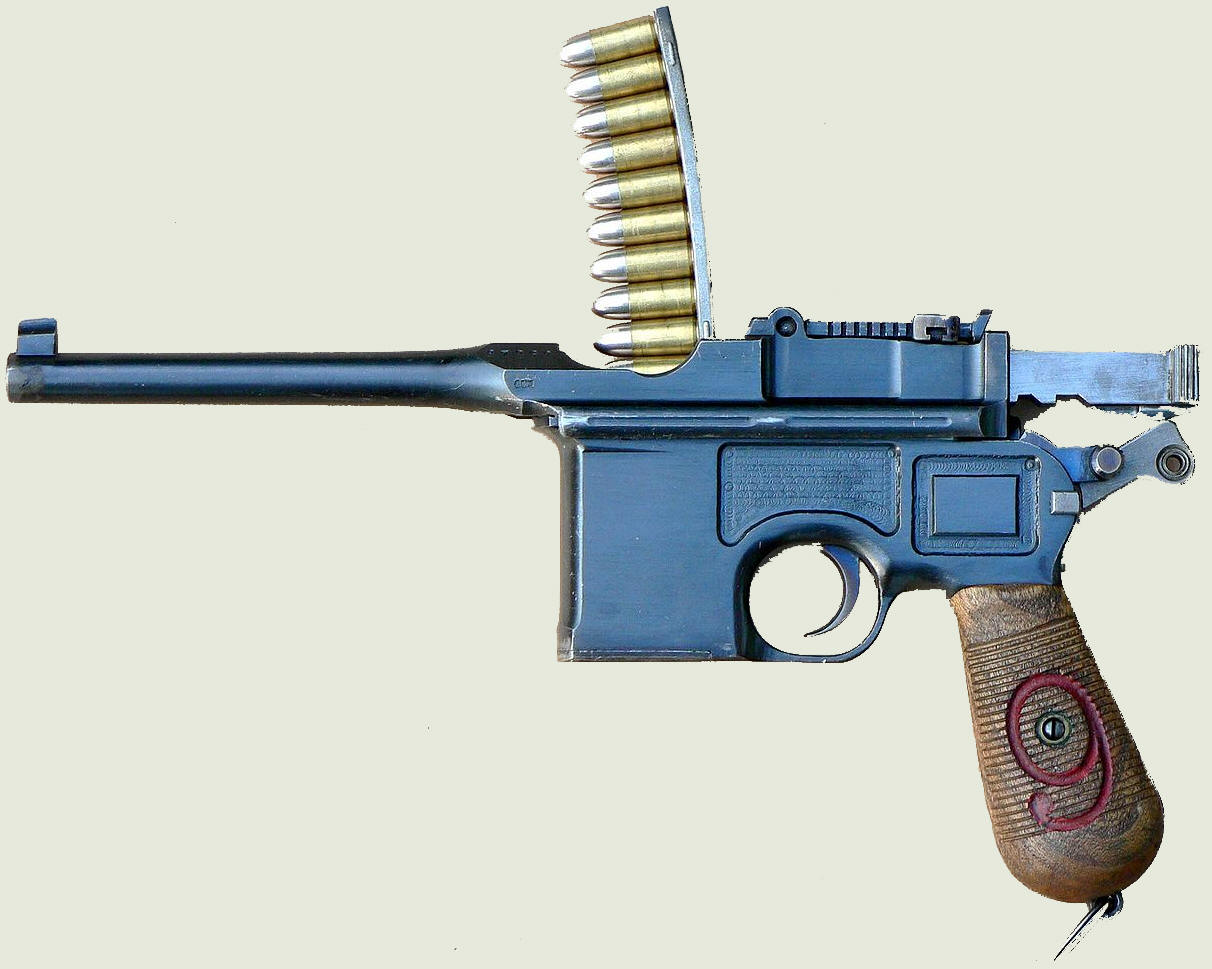 Маузер под 9-мм патрон от пистолета Парабеллум. Чтобы его случайно не пытались заряжать родными патронами, на рукоятке была вырезана девятка.